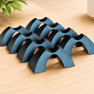 Eight Cable Arch speaker cable elevators arranged on a light wood surface in a clean audio system environment.