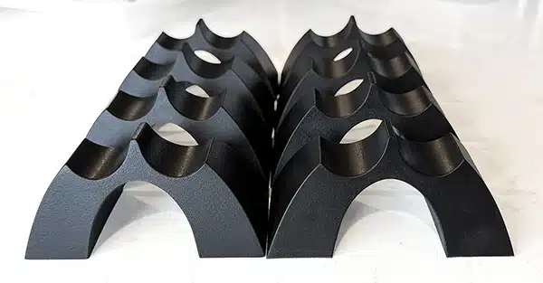 Eight Cable Arch Duo dual-channel speaker cable elevators arranged as a set